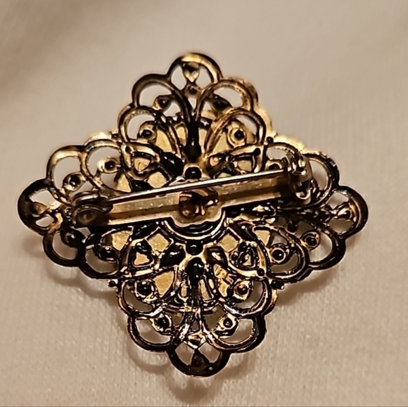Ornate bronze and reflective glass vintage brooch - Picture 2 of 4